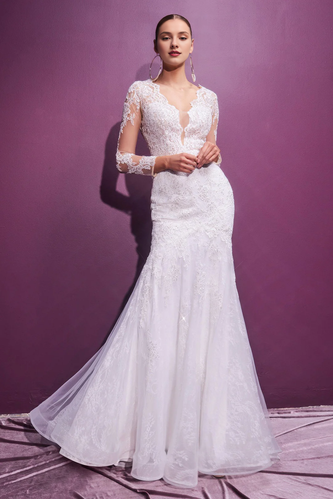 Long sleeved lace fishtail wedding dress