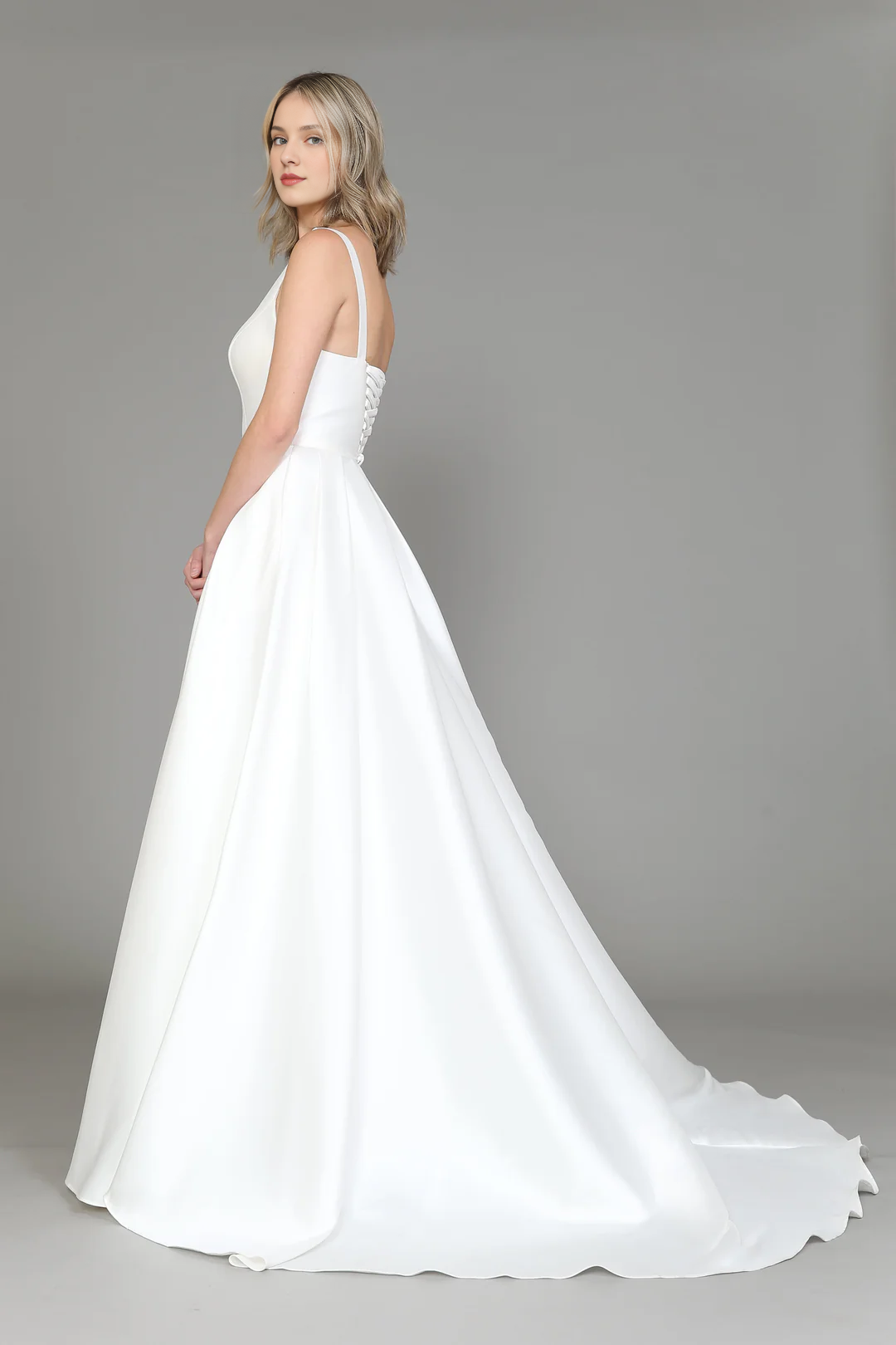 White long sleeveless satin wedding dress