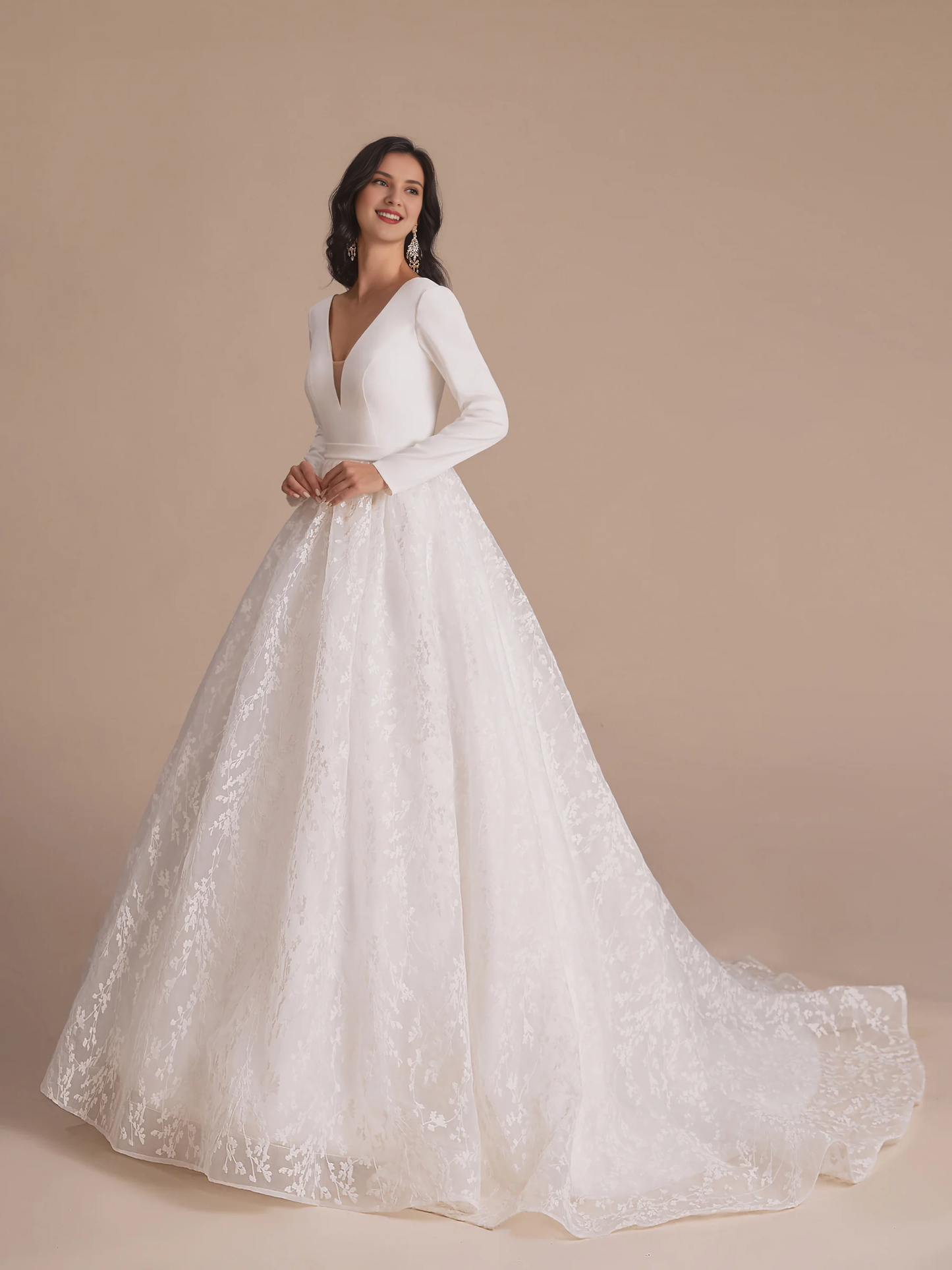 Long sleeved V-neck A-line backless lace wedding dress