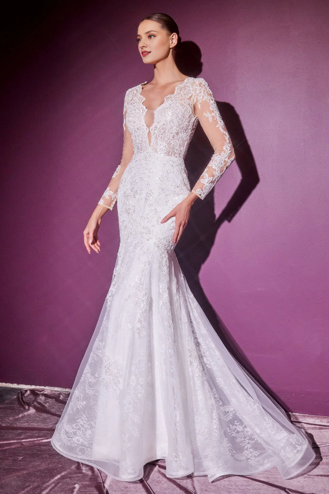 Long sleeved lace fishtail wedding dress