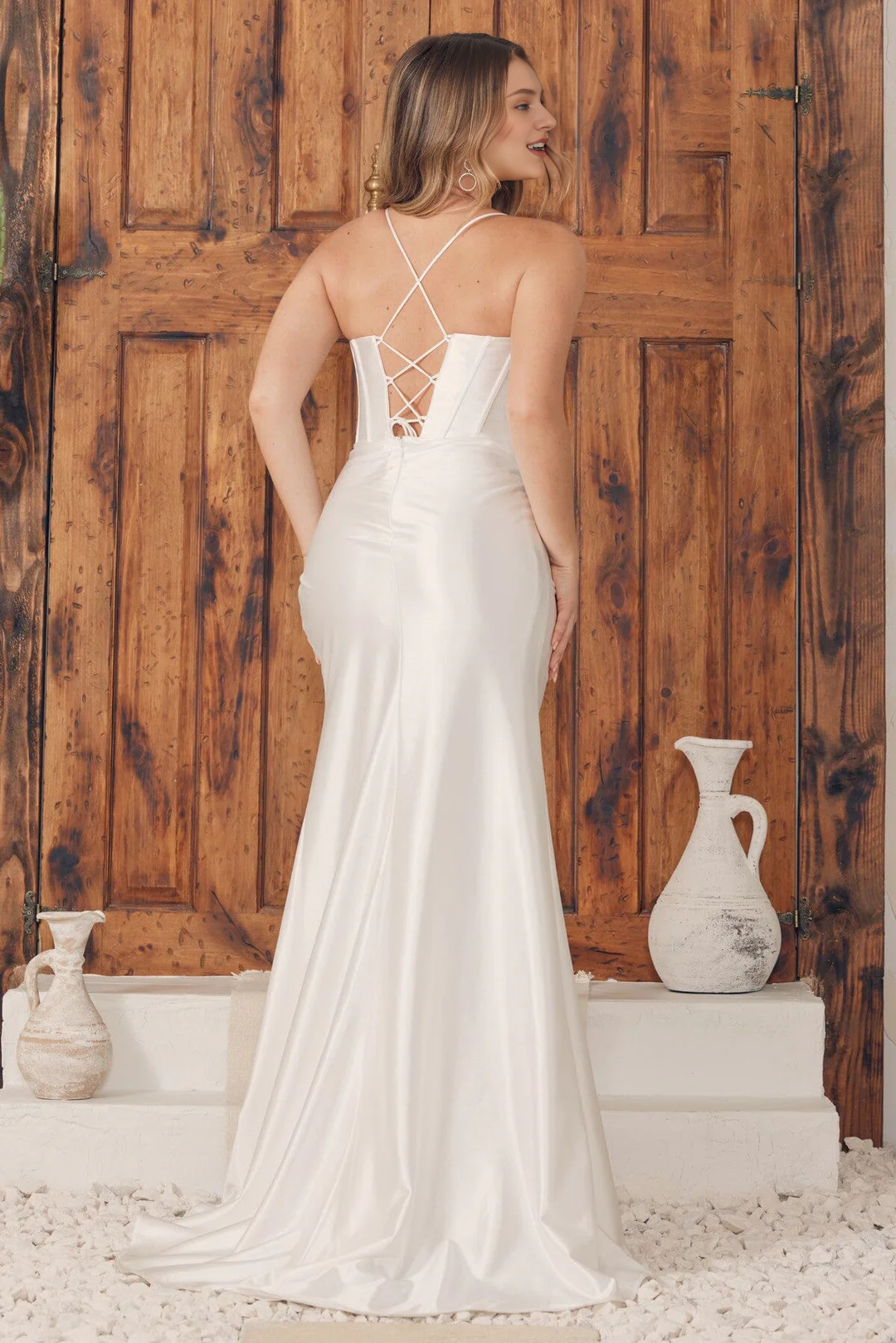 White long sleeveless high neck satin wedding dress