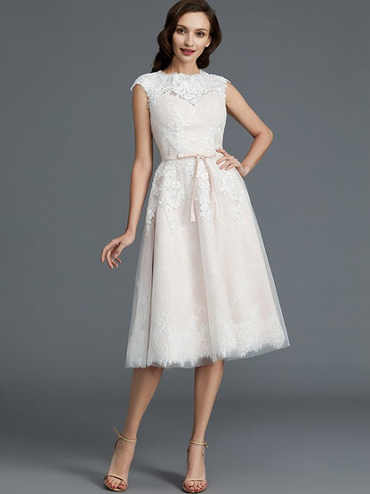 A-Line/Princess Sleeveless Bateau Knee-Length Tulle Wedding Dresses