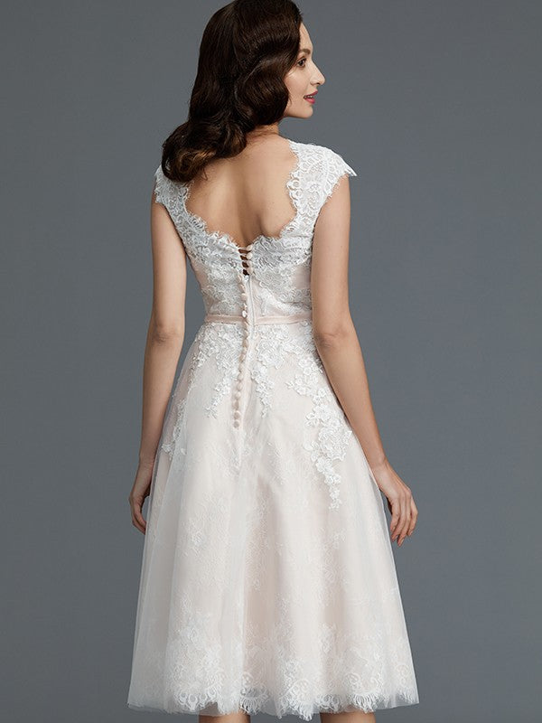 A-Line/Princess Sleeveless Bateau Knee-Length Tulle Wedding Dresses