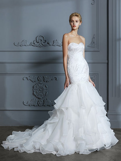 Trumpet/Mermaid Sweetheart Sleeveless Ruffles Sweep/Brush Train Organza Wedding Dresses