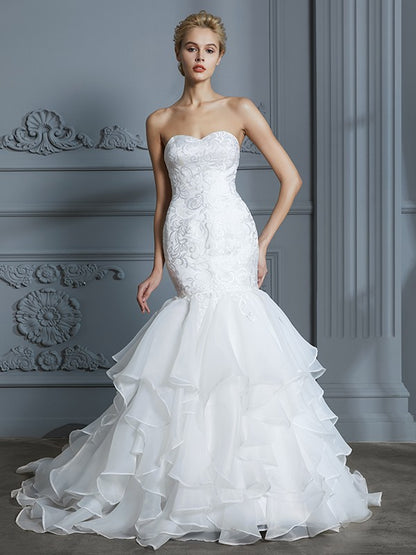 Trumpet/Mermaid Sweetheart Sleeveless Ruffles Sweep/Brush Train Organza Wedding Dresses