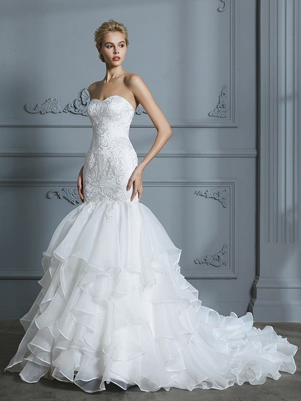 Trumpet/Mermaid Sweetheart Sleeveless Ruffles Sweep/Brush Train Organza Wedding Dresses