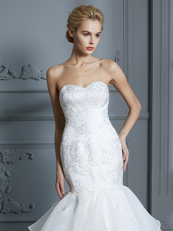 Trumpet/Mermaid Sweetheart Sleeveless Ruffles Sweep/Brush Train Organza Wedding Dresses