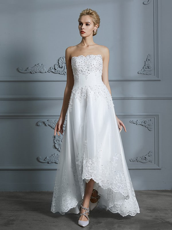 A-Line/Princess Sweetheart Sleeveless Beading Asymmetrical Tulle Wedding Dresses