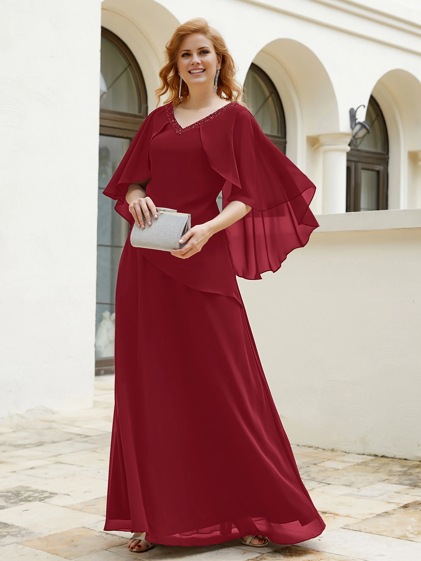 Elegant sleeves adorned with beaded mother of the bride dress