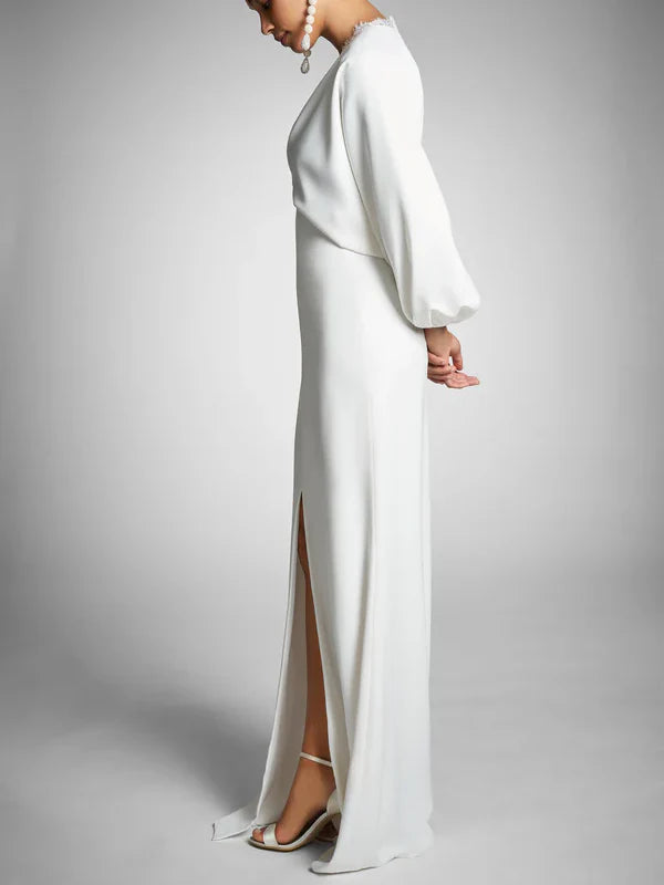 Tight fitting/column long sleeved V-neck and floor to ceiling wedding dress