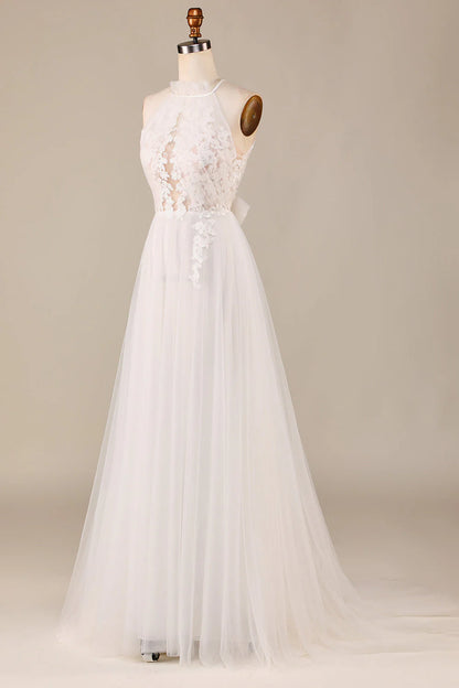 A charming A Line neckline sleeveless ivory backless lace sheer trailing wedding dress