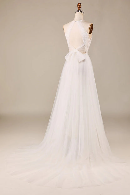 A charming A Line neckline sleeveless ivory backless lace sheer trailing wedding dress