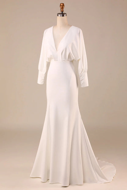 Minimalist ivory fishtail long sleeved backless deep V-neck wedding dress