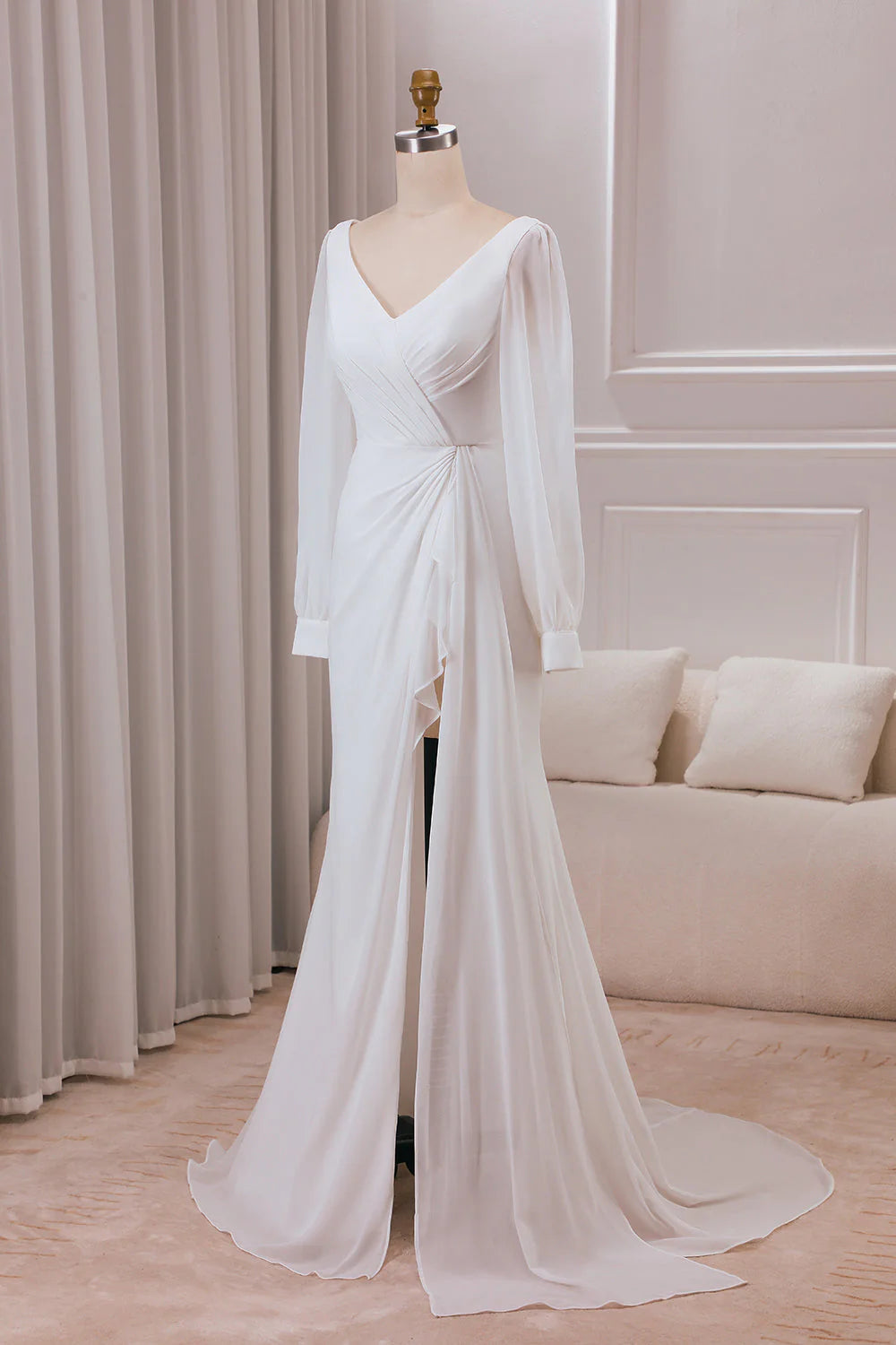 Ivory V-neck long sleeved A-line chiffon and floor length wedding dress