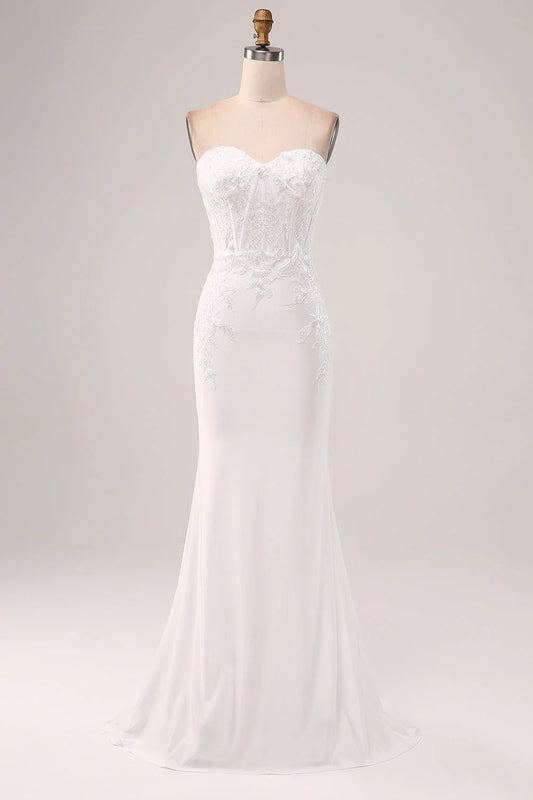 Ivory strapless off shoulder fishtail off back wedding dress