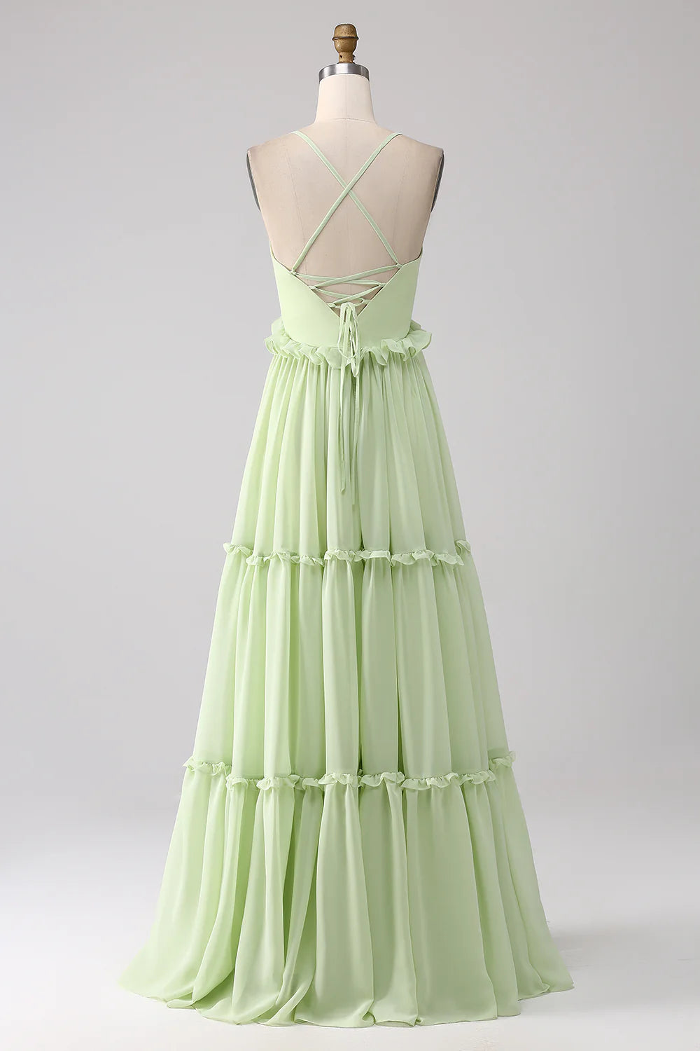 Light green A-line thin shoulder strap backless lotus leaf side length bridesmaid dress