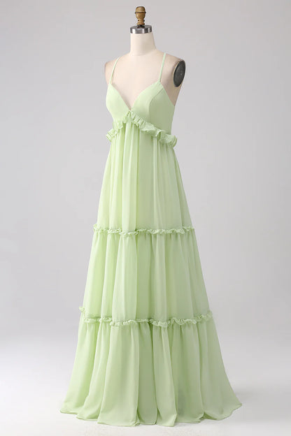 Light green A-line thin shoulder strap backless lotus leaf side length bridesmaid dress