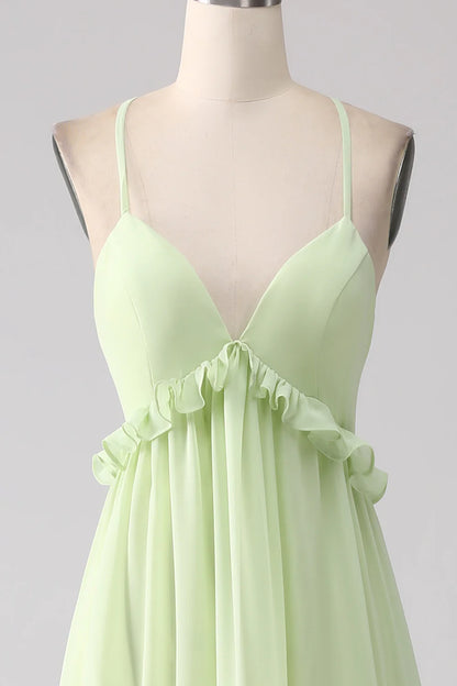 Light green A-line thin shoulder strap backless lotus leaf side length bridesmaid dress