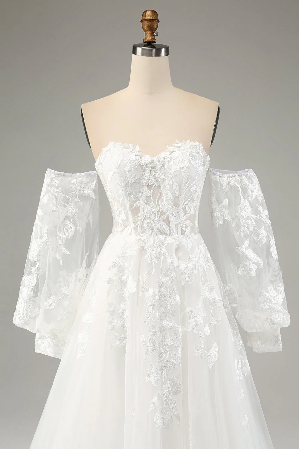 White A-line chiffon long sleeved wedding dress with applique lace