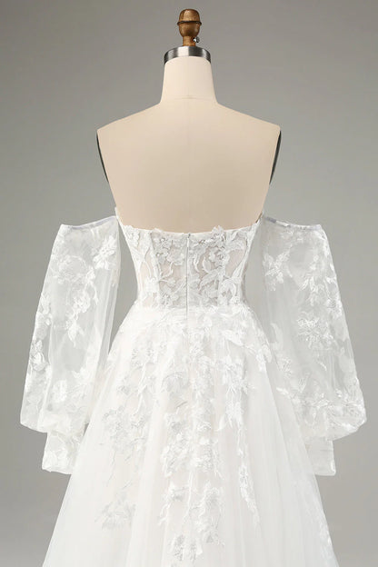 White A-line chiffon long sleeved wedding dress with applique lace