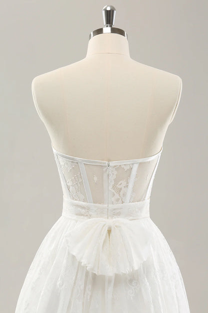 White strapless tight corset layered long wedding dress