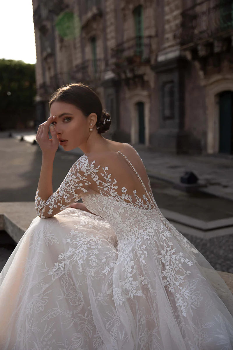 A-line neckline lace long sleeved wedding dress