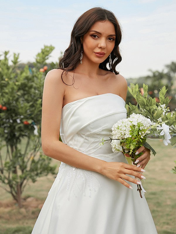 A-Line/Princess Satin Ruched Strapless Sleeveless Sweep/Brush Train Wedding Dresses