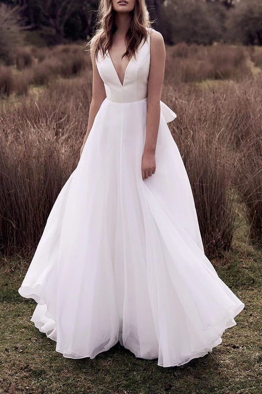 A-shaped deep V-neck ivory minimalist Bohemian style wedding dress with backless bride dress