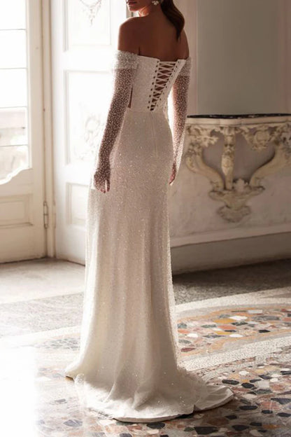 Off shoulder long sleeved slit fishtail wedding dress